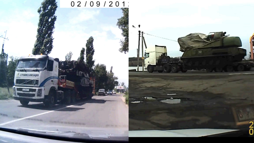 Oekraïense Buk 312 naast een van de beelden van de 3x2 Buk op 17 juli 2014